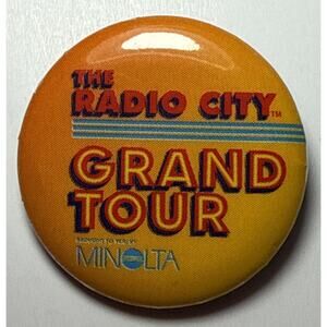 Vintage The Radio City Grand Tour Minolta 1.25" Pinback Button PB146